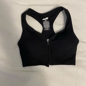 Unused zip-up sports bra